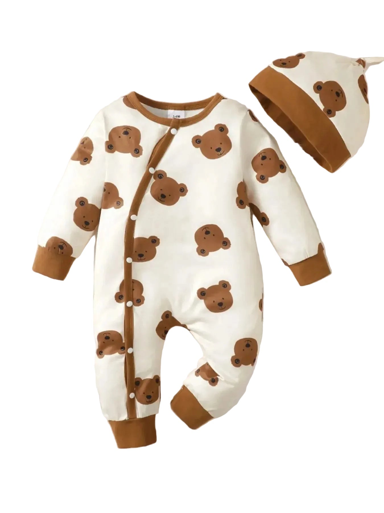 Baby romper with bear pattern and matching hat on a soft surface